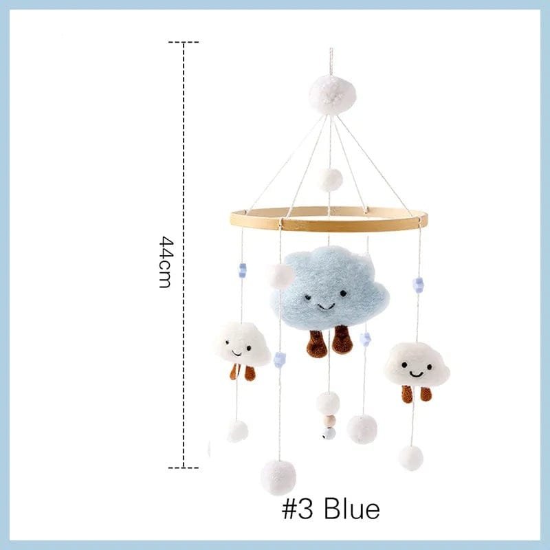 Baby mobile with cloud and sheep design, featuring dimensions and color code.