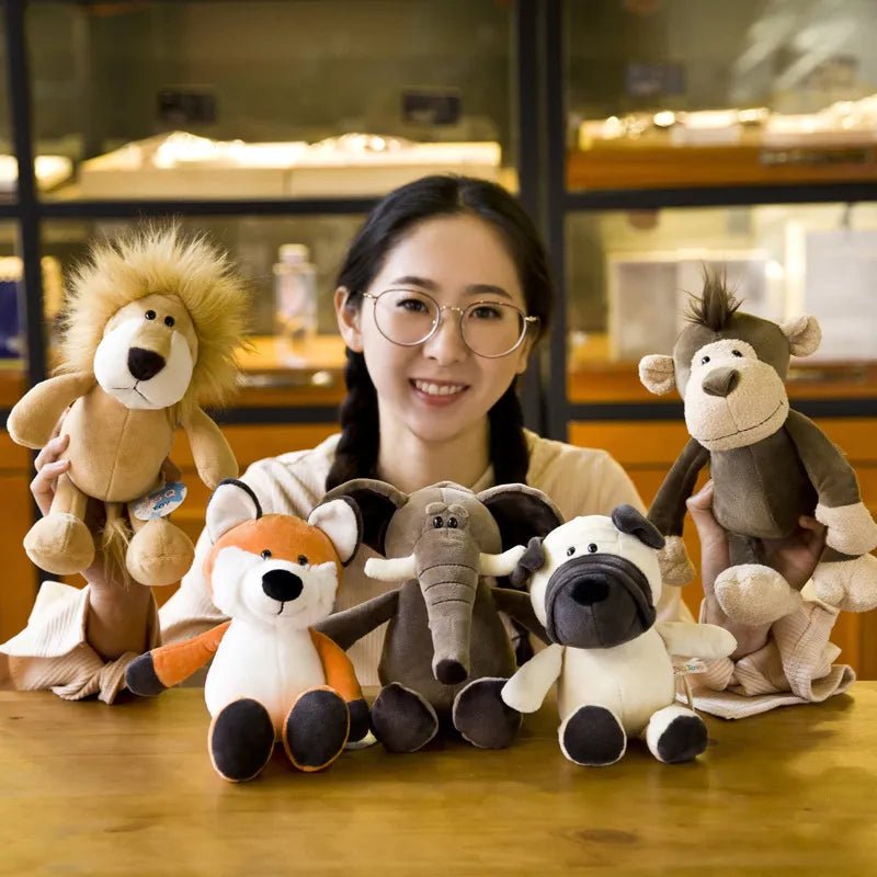 Woman holding a collection of plush animal toys in a store setting