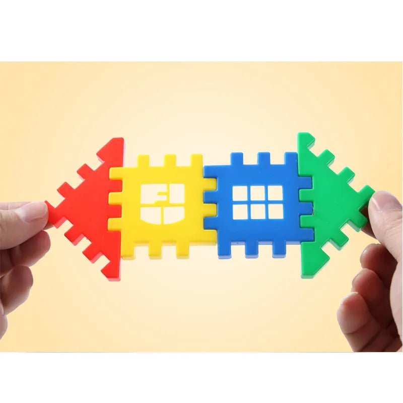 Colorful interlocking foam puzzle pieces held by two hands against a beige background
