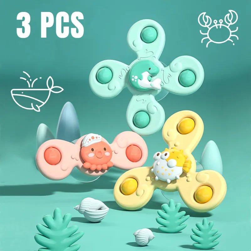 Three colorful fidget spinner toys on a teal background with '3 PCS' text and a crab icon.