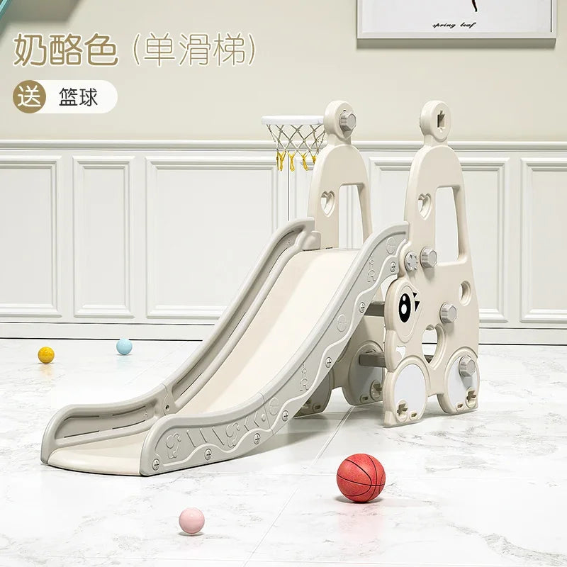 Children's slide with basketball hoop and balls on a light wooden floor.