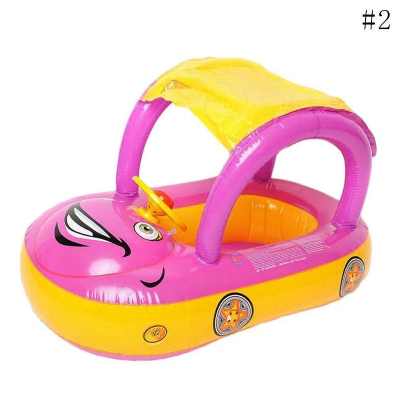 Inflatable baby pool float with pink zebra design and yellow canopy on a white background