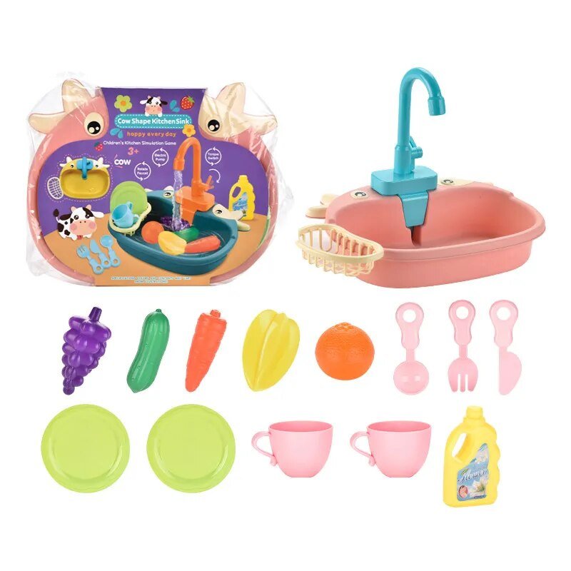 Toy kitchen set with sink, fruits, vegetables, and utensils on a white background