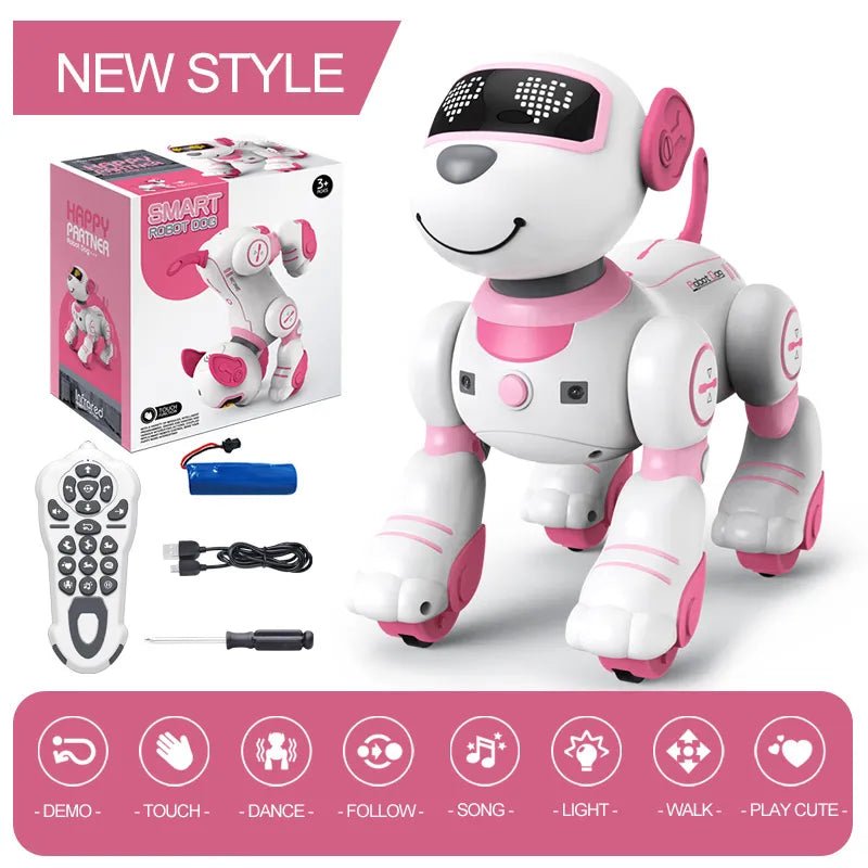 Pink and white robot toy with remote control, batteries, and packaging on a white background.