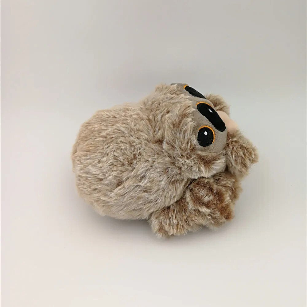 Plush toy sloth on a white background