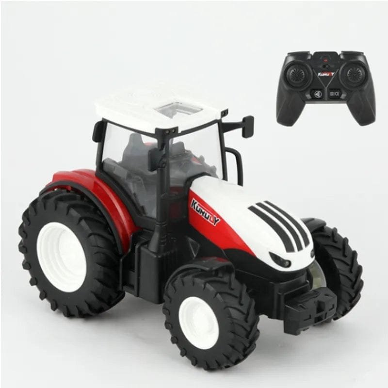 Toy tractor with a remote control on a white background