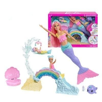 Barbie mermaid doll set with accessories and packaging on a white background