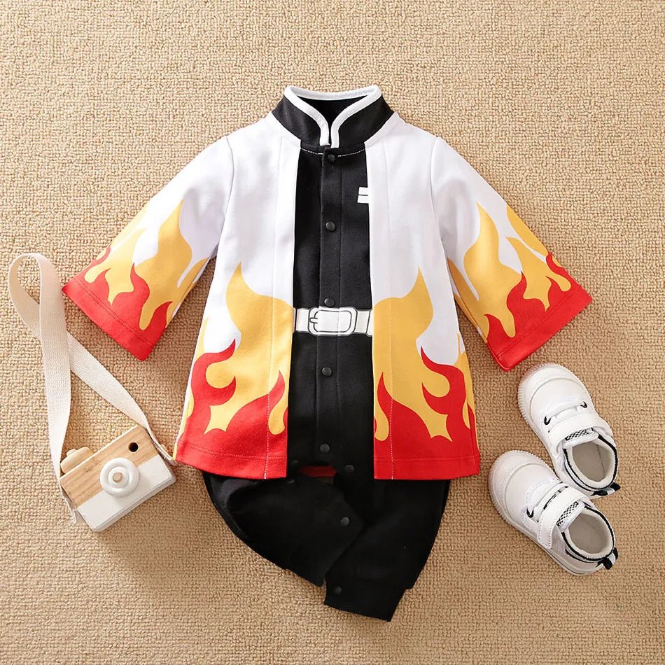 Children's outfit with flame-patterned jacket, black pants, white sneakers, and small camera bag