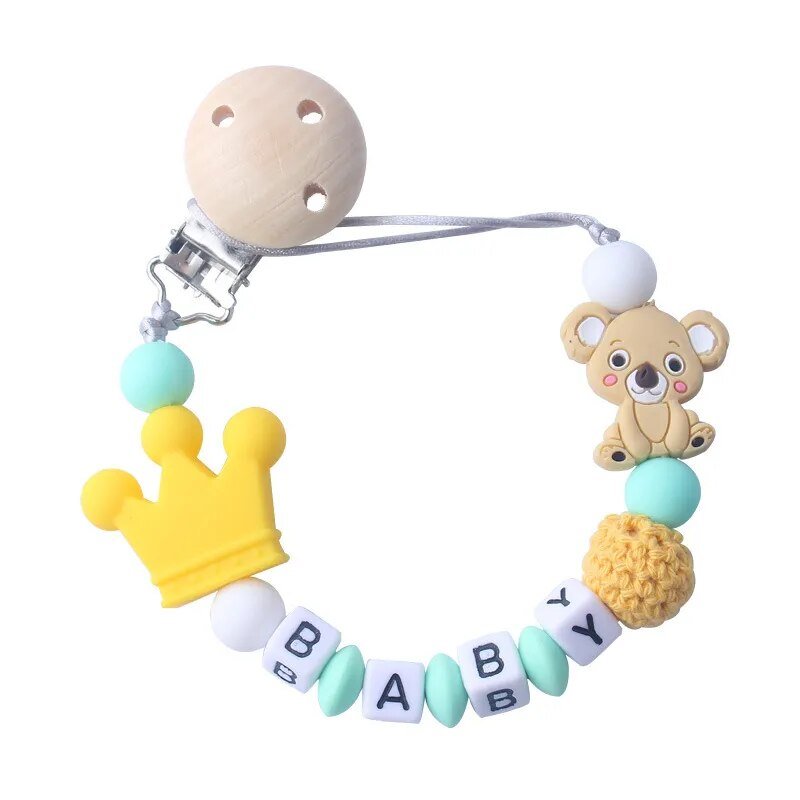 Baby teething toy with colorful beads and a bear design on a white background