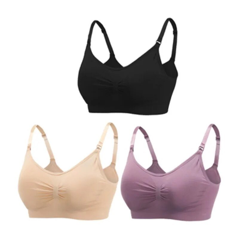 Black, beige, and purple bras on a white background