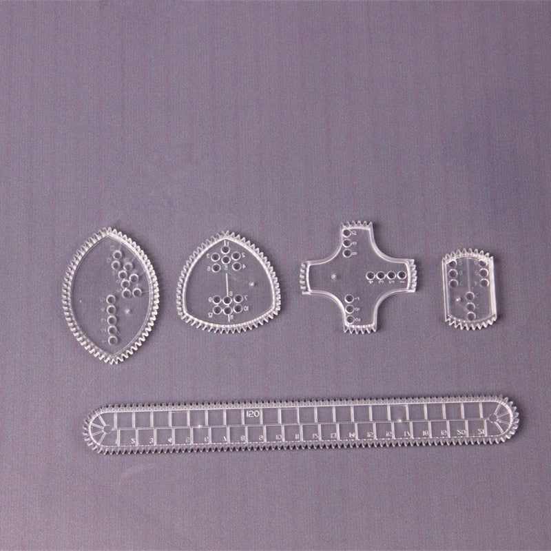 Set of clear plastic sewing templates.
