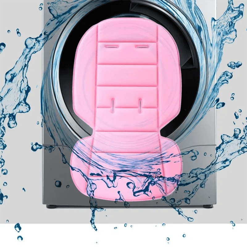 Pink car seat cover with water splashes around a washing machine, symbolizing cleaning.