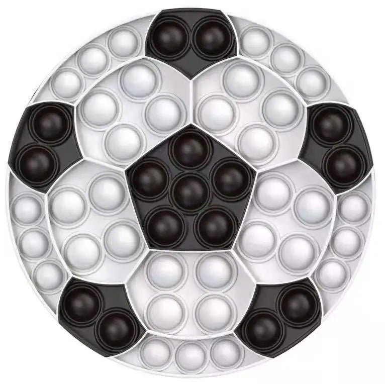 Circular pop-it fidget toy with alternating black and white bubbles