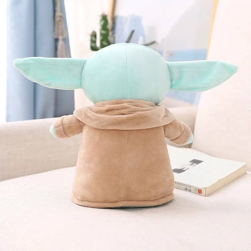 Plush toy resembling a character with large ears on a couch