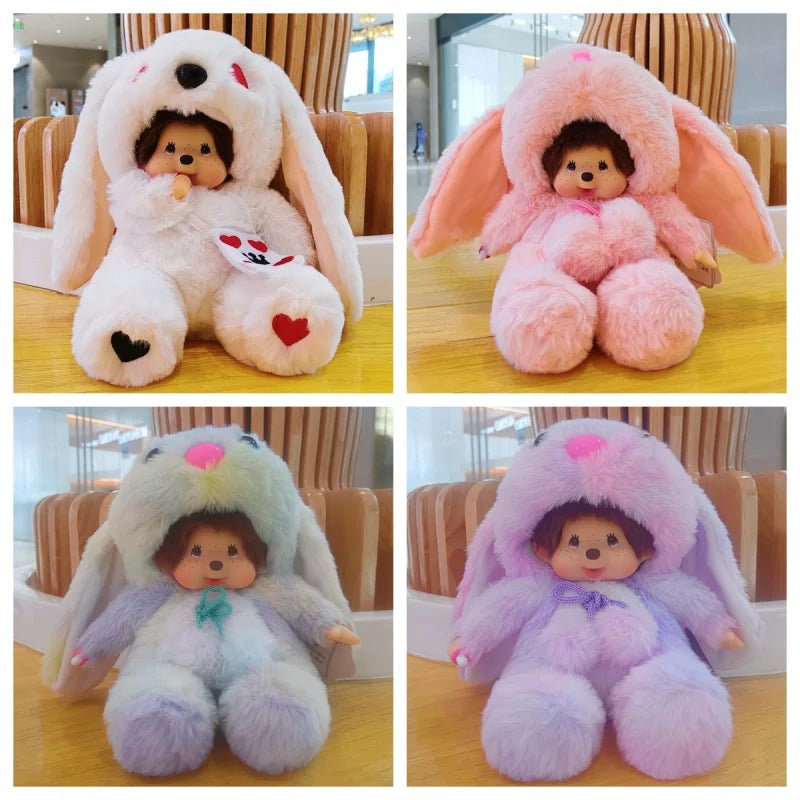 Four different colored plush toys with bunny ears on a wooden table.