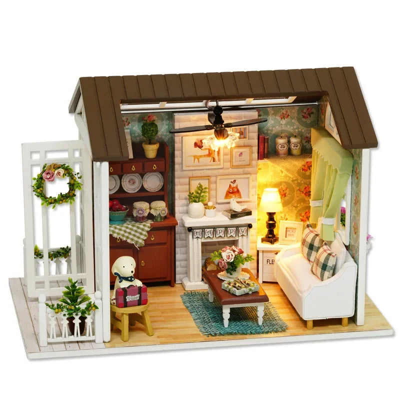 Miniature model of a living room with furniture and decor.
