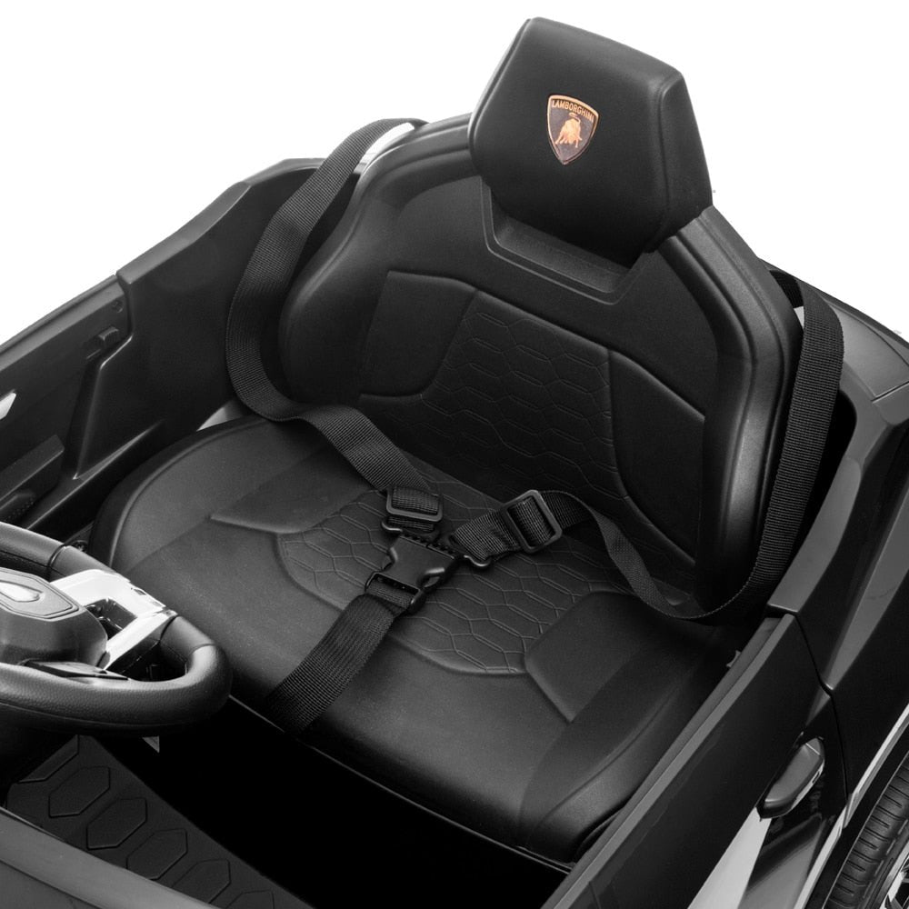 Black children's toy car with a seat and steering wheel.