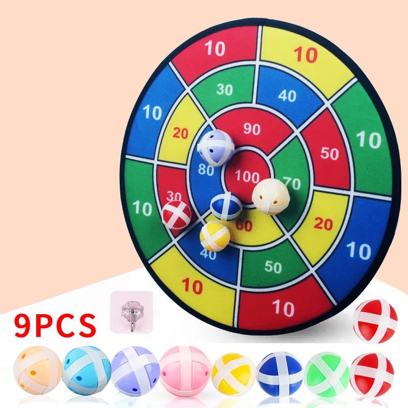 Colorful dartboard game with darts on a beige background