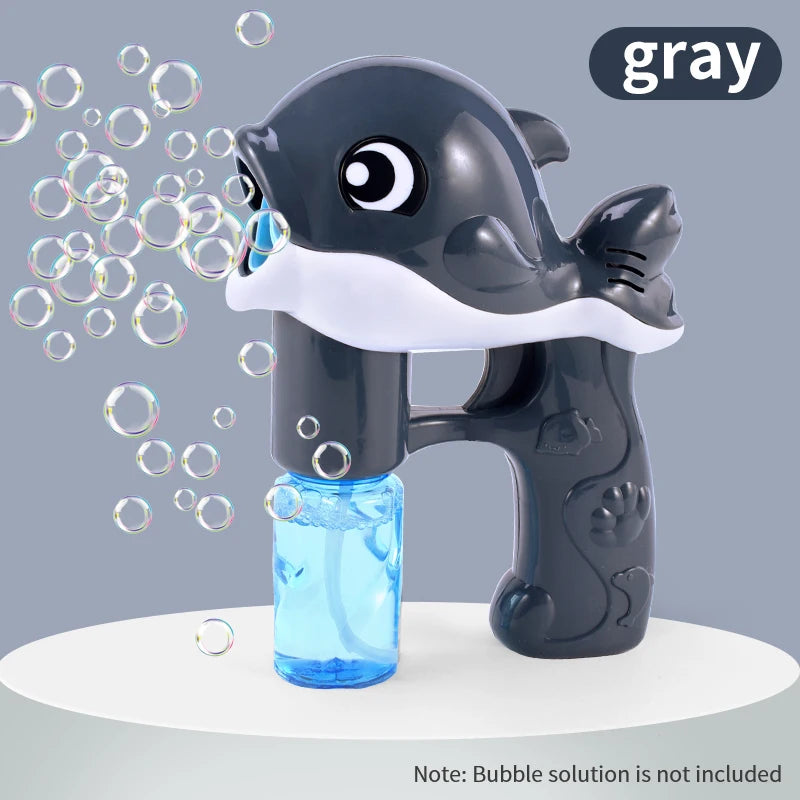 Gray whale-shaped bubble gun with bubbles on a gray background