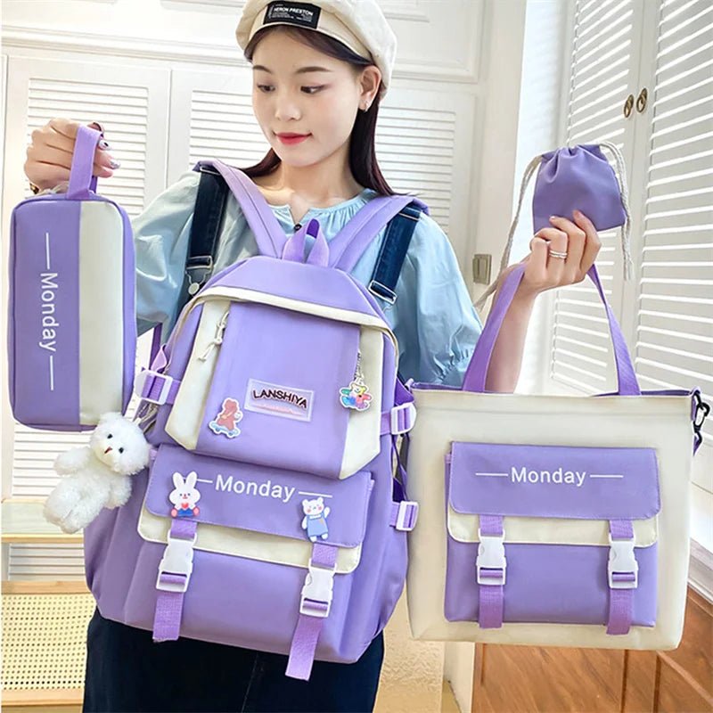 Person wearing a purple backpack with matching pouches and a tote bag, holding a small purple bag.