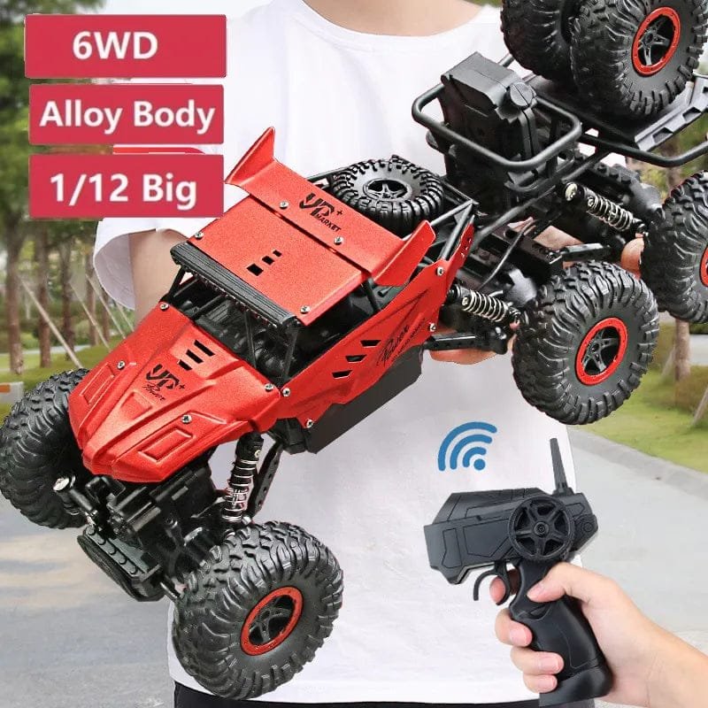 Red remote control toy truck with a person holding it, featuring '6WD Alloy Body 1/12 Big' text.