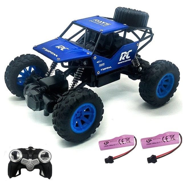 Blue and black RC monster truck with remote control and batteries.