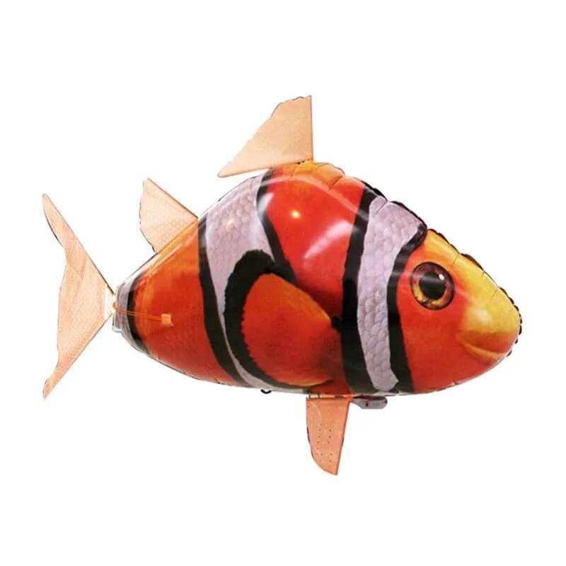 Toy fish with orange, black, and white colors.