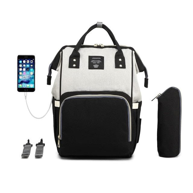Black and white backpack with USB port, phone, and pouch