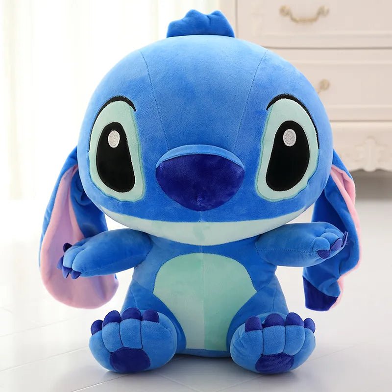 Blue plush toy with large eyes.