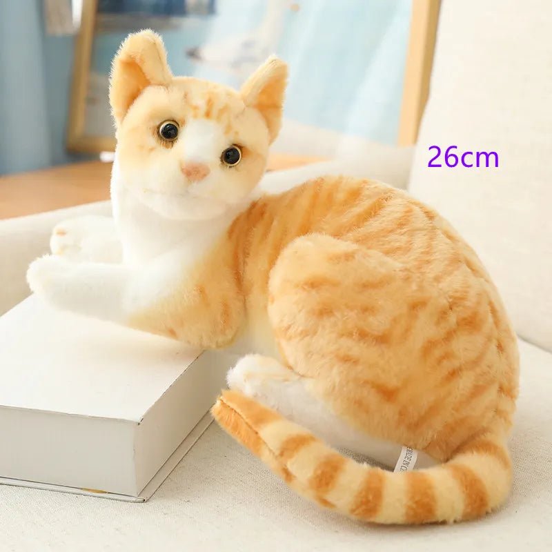 Plush toy cat on a white surface