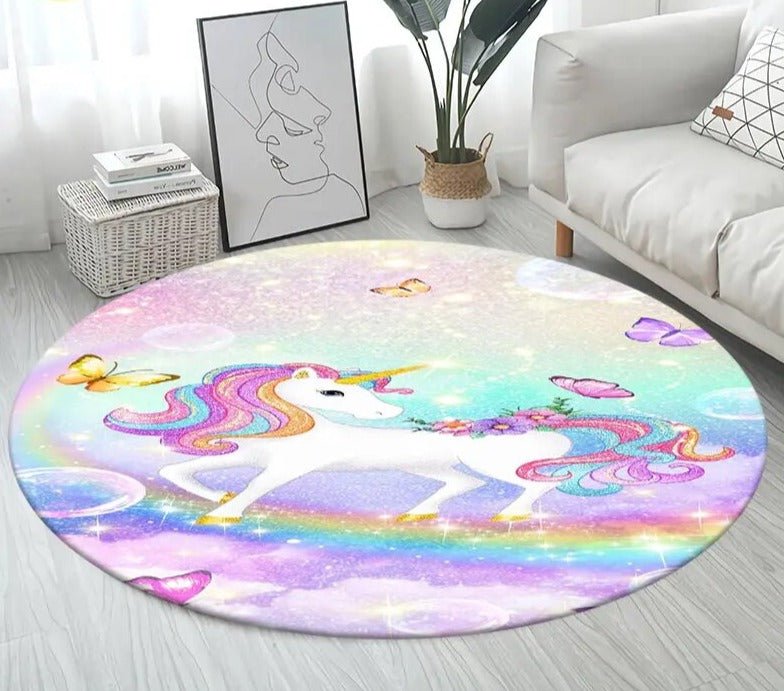 Round rug with a unicorn design in a living room setting