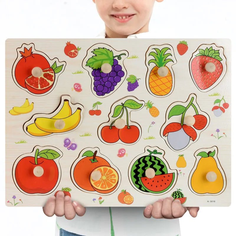 Child holding a wooden puzzle with colorful fruit shapes
