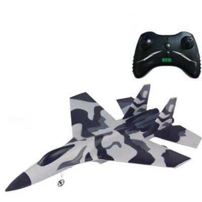 Camouflage-patterned remote control airplane with a black controller