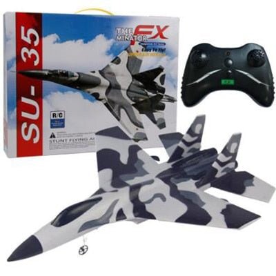 Camouflage-patterned remote control airplane with packaging and controller.