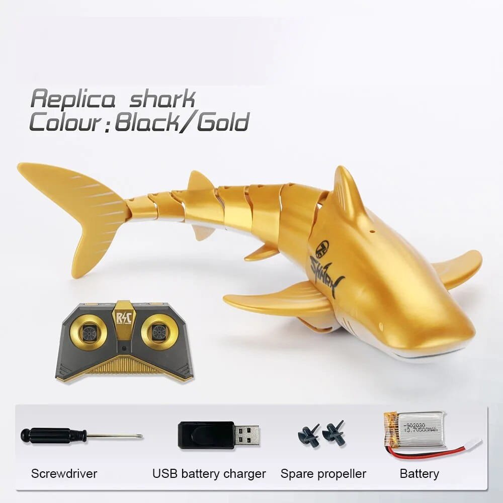 Gold and black remote control shark toy with accessories