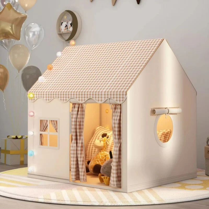 Children's playhouse with interior lighting, balloons, and a teddy bear in a room.