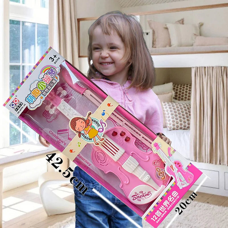 Child holding a pink toy keyboard in a bedroom setting