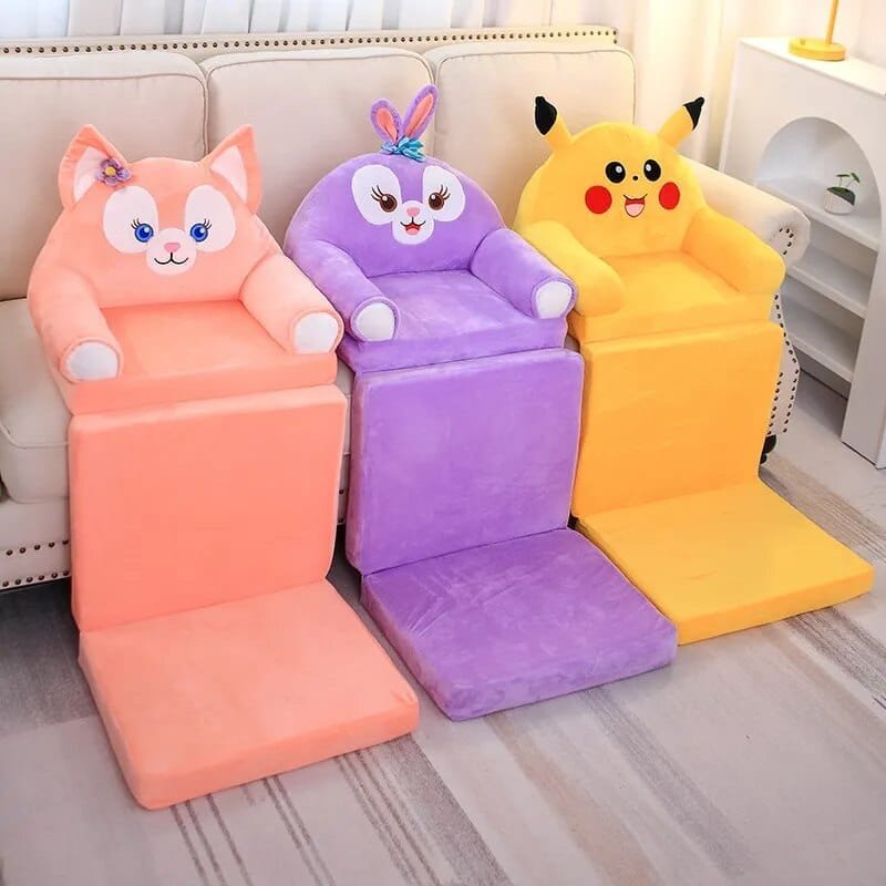 Three colorful cartoon-shaped chairs on a floor.