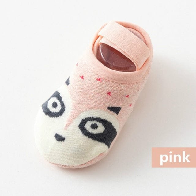 Pink baby socks with raccoon design
