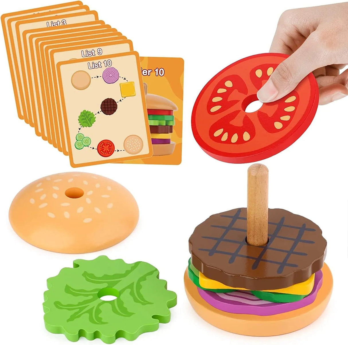 Toy hamburger set with cards and a hand holding a tomato piece.