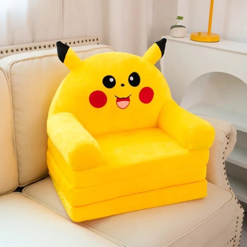 Yellow Pikachu-shaped chair on a beige couch