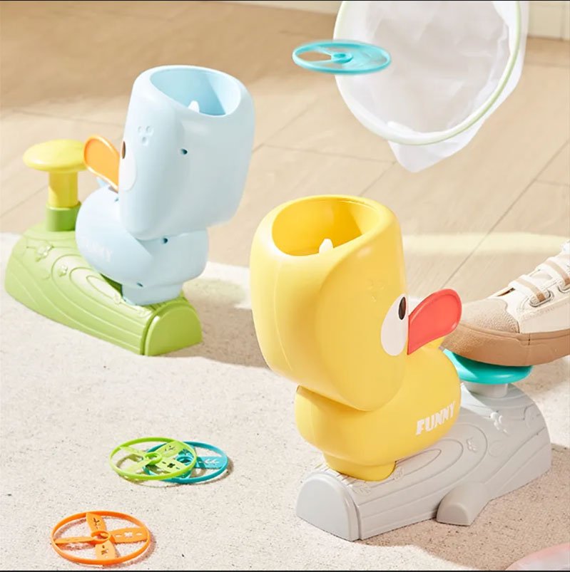 Two colorful duck-shaped toys.