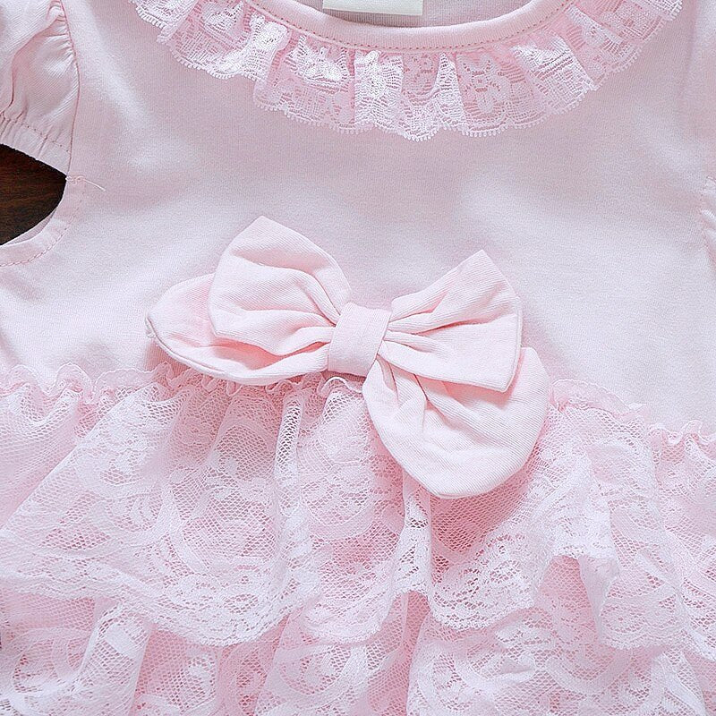 Pink lace dress with a bow