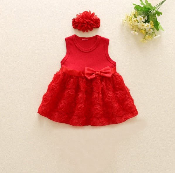 Red baby dress with a bow and matching headband