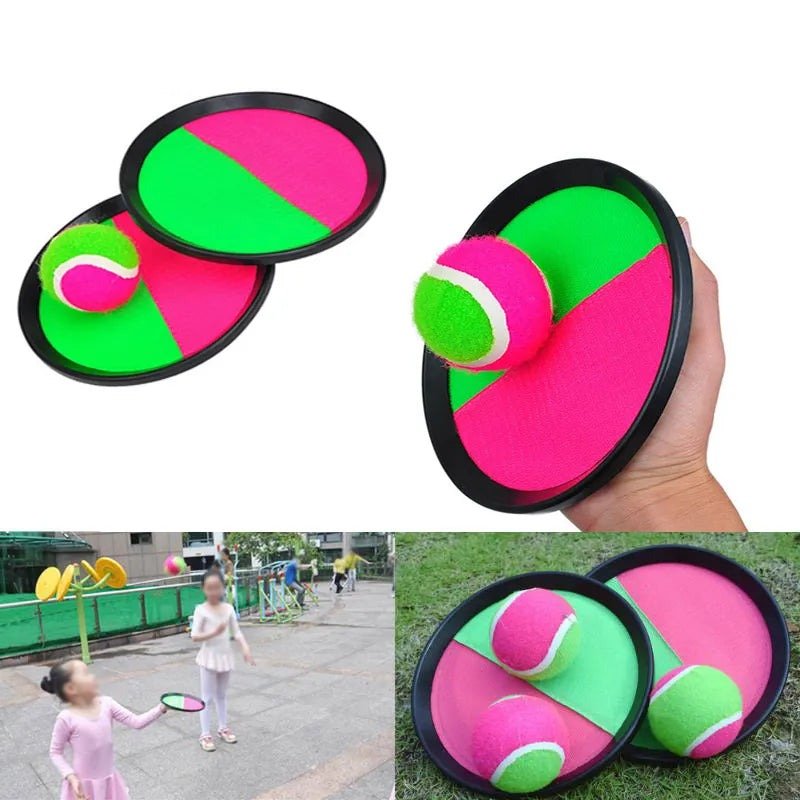 Two pink and green disc toys with a hand holding one, and two people playing with them outdoors.