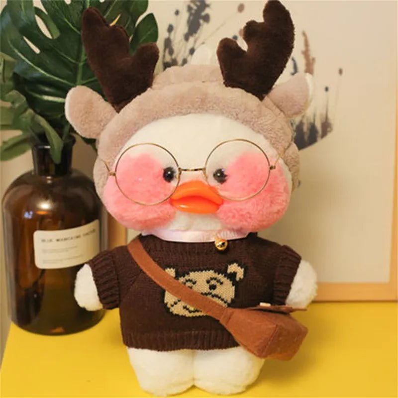 Plush toy with deer antlers and glasses on a yellow surface