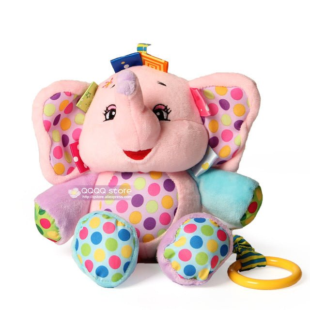 Colorful elephant plush toy with polka dot patterns on a white background