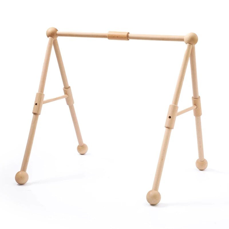 Wooden baby gym on a white background