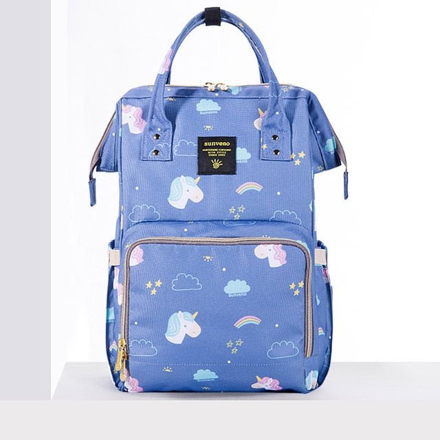 Blue backpack with unicorn and cloud patterns.