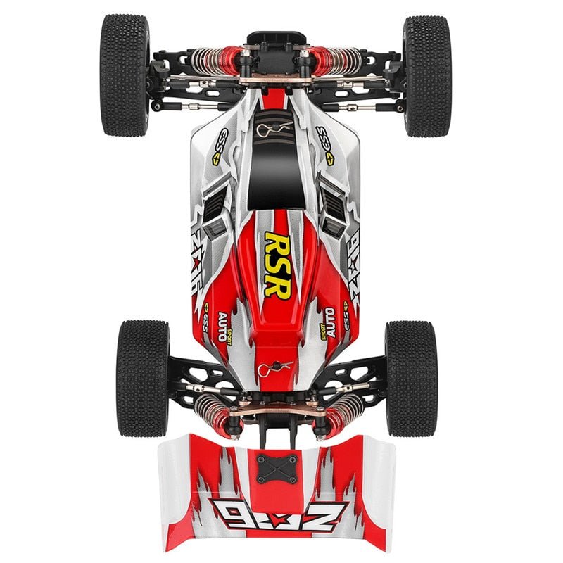 Top view of a red and white RC car chassis with visible branding on a white background
